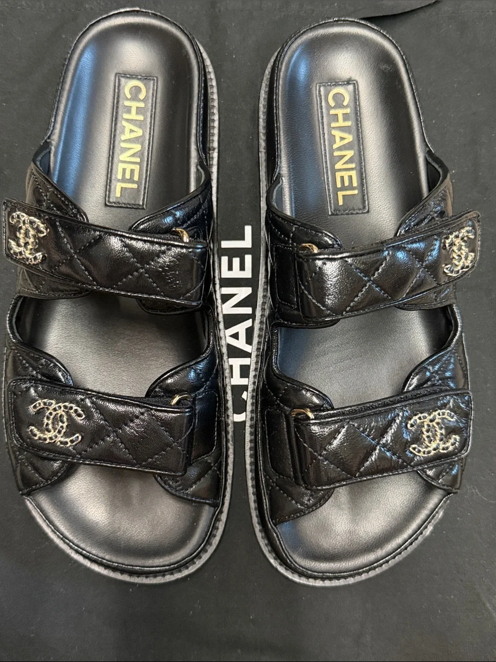 CHANEL Black Quilted Double-Strap Logo Slides with Gold Hardware